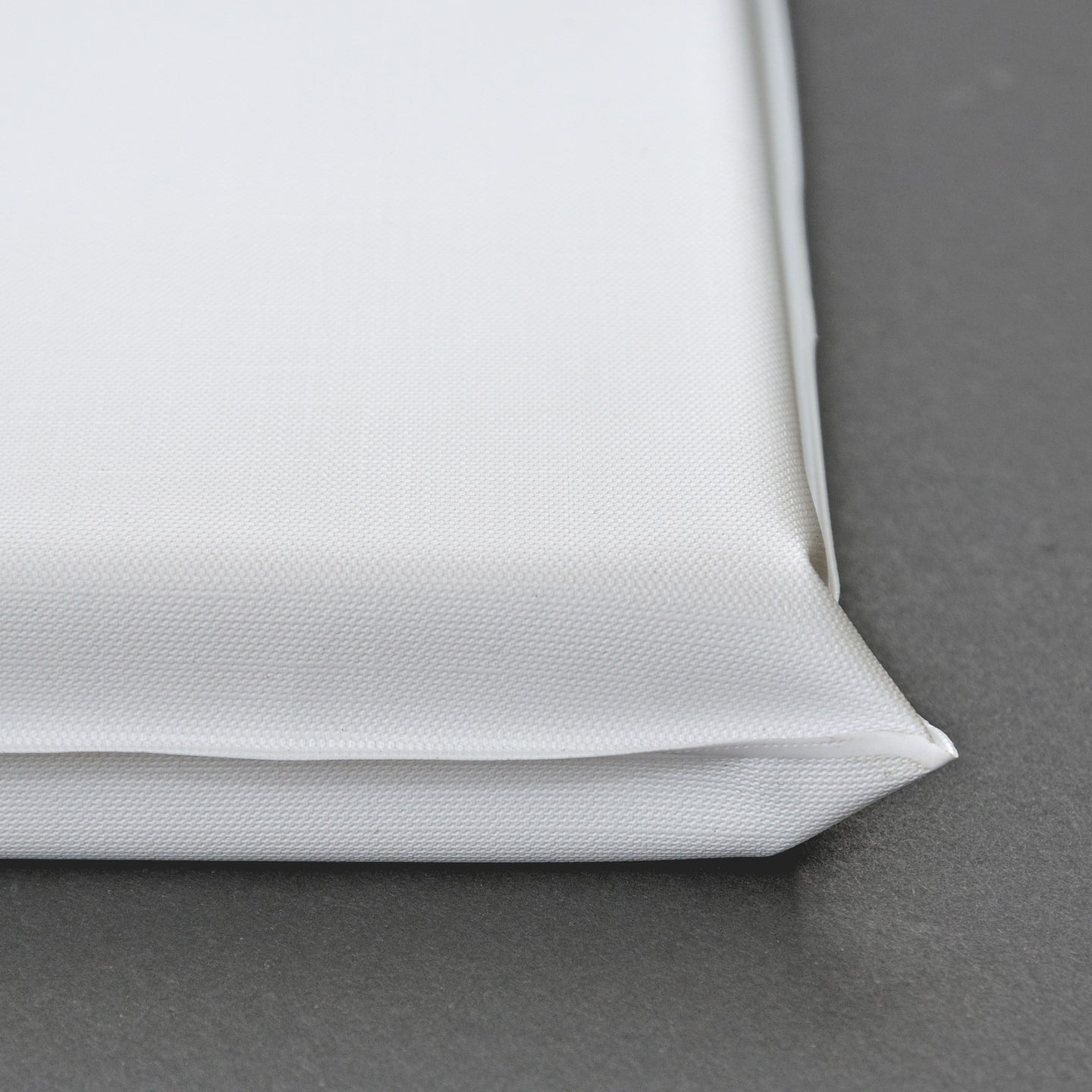 Matelas à langer mousse PVC blanc 69x49 cm - Détail coin
